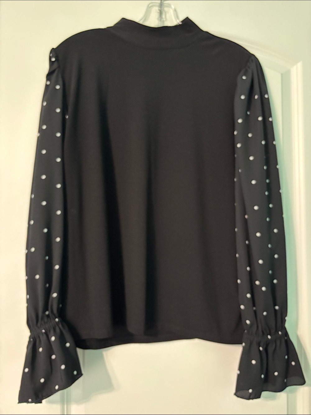 CeCe Black Top with White Polka-Dot Bell Sleeves